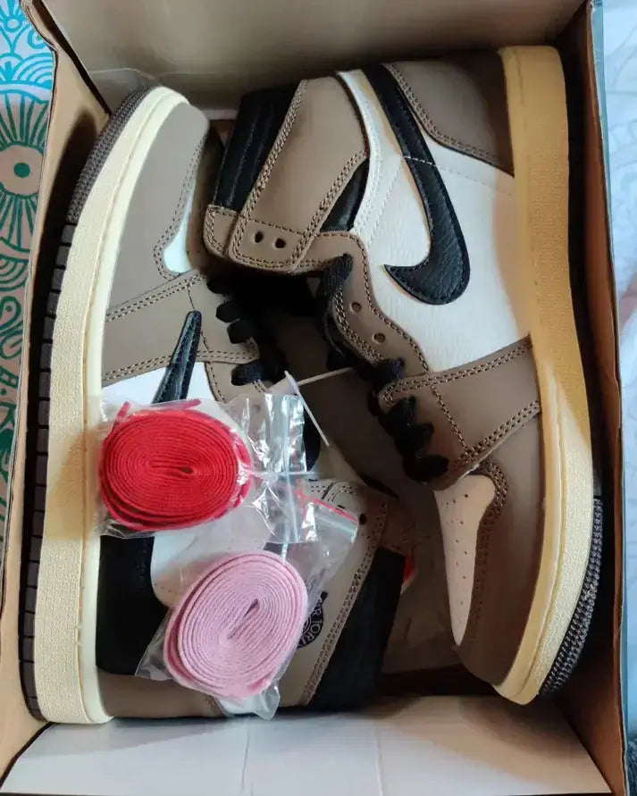 Travis Scott X Nike Air Jordan 1 High Cactus Jack Mocha sneakers with red and pink laces in box